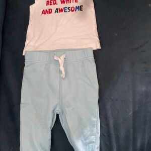 White shirt with words and blue pants for baby